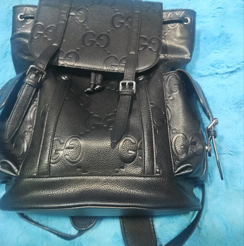Gucci Black Embossed GG Leather Drawstring Backpack